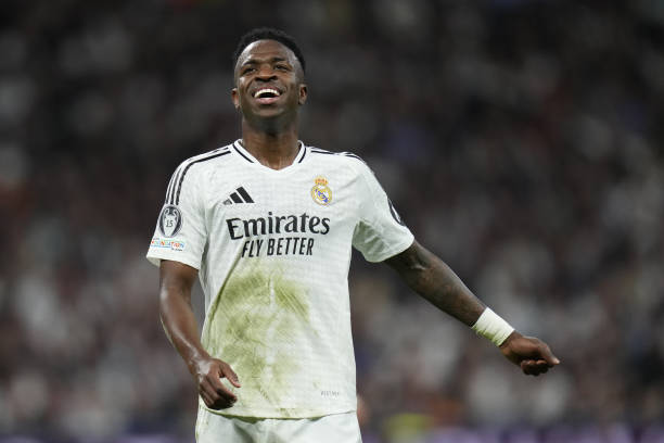 Vinicius Jr responded to Manchester City fans regarding a “Stop Crying Your Heart Out” banner on social media following Manchester City’s elimination by Real Madrid.